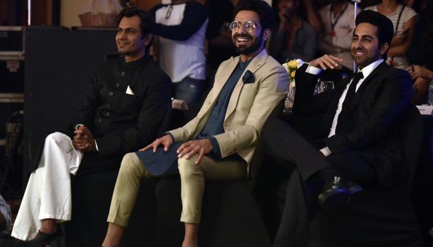Actors Nawazuddin Siddiqui, Ayushmann Khurrana and Aparshakti Khurana made for a dandy trio at the do. (Anshuman Poyrekar/HT Photo) 