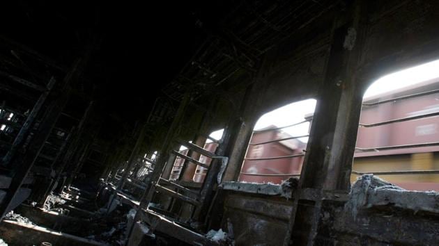 A view of a burnt carriage of Samjhauta Express train in Deewana, near Panipat town, February 19, 2007. REUTERS/Desmond Boylan/File Photo(REUTERS File)