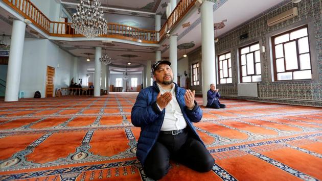 Qurbanjan Nourmuhammed prays at a mosque in Istanbul. Nourmuhammed has not heard from his son Pakzat since he went back to Xinjiang in 2016 to visit his grandparents. A friend of Pakzat’s told Nourmuhammed that Pakzat was detained upon arrival. He believes the government accuses him of having links with extreme Islamists. (Murad Sezer / REUTERS) Qurbanjan Nourmuhammed prays at a mosque in Istanbul. Nourmuhammed has not heard from his son Pakzat since he went back to Xinjiang in 2016 to visit his grandparents. A friend of Pakzat’s told Nourmuhammed that Pakzat was detained upon arrival. He believes the government accuses him of having links with extreme Islamists. (Murad Sezer / REUTERS)