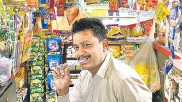 Sunil Jain, the owner of the Jain Paan House on KG Marg. The kiosk was opened by Jain’s father Bhagchand back in 1975.(HT Photo)