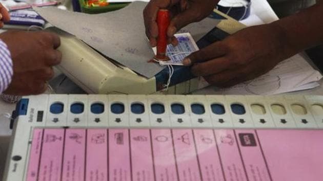 Mumbai, India - Oct. 8, 2014 : Election Commission staff seals the Electronic Voting Machines (EVMs) at 181 Mahim Assembly (Vidhan Sabha) Constituency election office in D'Silva School, Dadar, Mumbai, India on Wednesday, October 8, 2014, days ahead of the upcoming ASSEMBLY (VIDHAN SABHA) ELECTIONS on October 15, 2014. (Photo by Kalpak Pathak / Hindustan Times)(Hindustan Times)