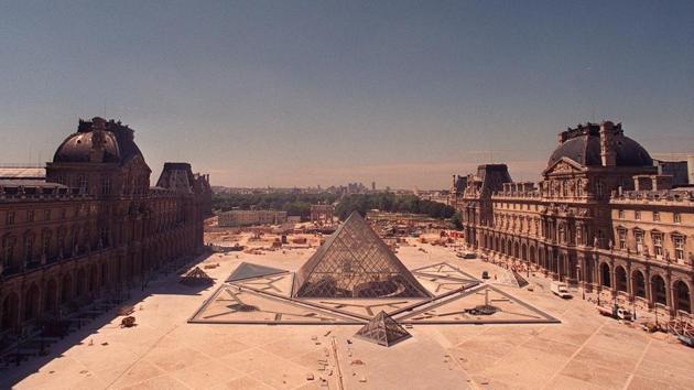 The louvre Pyramid under construction on July 28, 1988. A whole wing of the Louvre was then occupied by the French ministry of finance, which held the purse strings of the state, and would be difficult to budge. The museum’s huge “Napoleon Courtyard was an appalling car park,” Lang told AFP. “The museum was handicapped by the lack of a central entrance.” (Joel Robine / AFP) The louvre Pyramid under construction on July 28, 1988. A whole wing of the Louvre was then occupied by the French ministry of finance, which held the purse strings of the state, and would be difficult to budge. The museum’s huge “Napoleon Courtyard was an appalling car park,” Lang told AFP. “The museum was handicapped by the lack of a central entrance.” (Joel Robine / AFP)