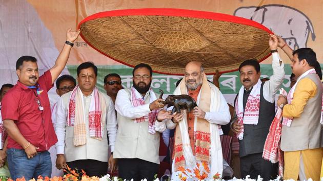 The BJP will conduct a citizenship screening exercise in Bengal to identify and weed out infiltrators, party president Amit Shah said at a public rally in Alipurduars, West Bengal on Friday. “We want to assure each and every Hindu refugee that none has to leave the country. All of you will have a place to live in India with respect. The Citizenship Amendment Bill is our commitment,” said Shah. (Biju Boro / AFP) The BJP will conduct a citizenship screening exercise in Bengal to identify and weed out infiltrators, party president Amit Shah said at a public rally in Alipurduars, West Bengal on Friday. “We want to assure each and every Hindu refugee that none has to leave the country. All of you will have a place to live in India with respect. The Citizenship Amendment Bill is our commitment,” said Shah. (Biju Boro / AFP)