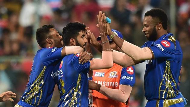 Bengaluru: MI bowler Jasprit Bumrah celebrate with teammates after taking wicket of RCB batsman Virat Kohli (L) during the Indian Premier League 2019. (PTI) Bengaluru: MI bowler Jasprit Bumrah celebrate with teammates after taking wicket of RCB batsman Virat Kohli (L) during the Indian Premier League 2019. (PTI)