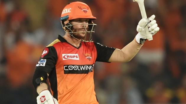 SRH batsman David Warner raises his bat after completing half-century. (PTI)