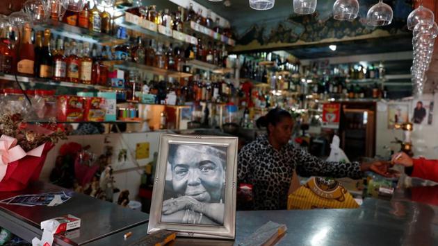 A photograph of Cape Verde singing legend Cesaria Evora sits inside a restaurant. It was in 1960s when people started settling in Cova Moura, but it was only in 1974, when the “Carnation Revolution” ended Portugal’s dictatorship, that the neighbourhood became a hub for migrants coming from the former colonies in Africa. (Rafael Marchante / REUTERS) A photograph of Cape Verde singing legend Cesaria Evora sits inside a restaurant. It was in 1960s when people started settling in Cova Moura, but it was only in 1974, when the “Carnation Revolution” ended Portugal’s dictatorship, that the neighbourhood became a hub for migrants coming from the former colonies in Africa. (Rafael Marchante / REUTERS)