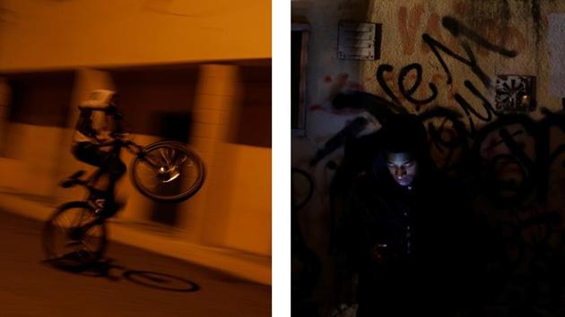 A boy rides a bicycle on a street and a man checks his phone. The area remains notorious within Portugal for its crime rate and a trial over alleged police brutality. Seventeen officers at a local police station have been charged with torture, kidnapping, falsifying reports and other crimes. Police declined to comment as the trial is ongoing. (Rafael Marchante / REUTERS) A boy rides a bicycle on a street and a man checks his phone. The area remains notorious within Portugal for its crime rate and a trial over alleged police brutality. Seventeen officers at a local police station have been charged with torture, kidnapping, falsifying reports and other crimes. Police declined to comment as the trial is ongoing. (Rafael Marchante / REUTERS)
