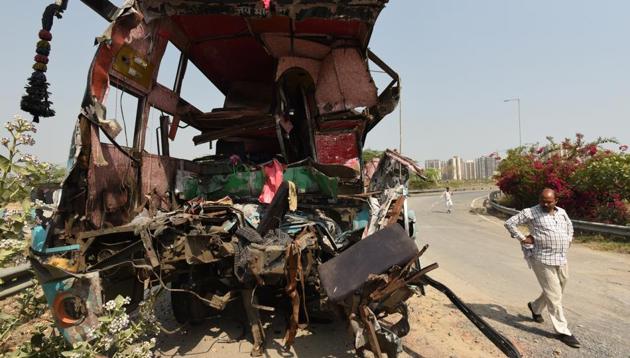 The mangled remains of the sleeper bus that crashed into a truck on the Yamuna Expressway on Friday, March 29, 2019.(Virendra Singh Gosain/HT PHOTO)