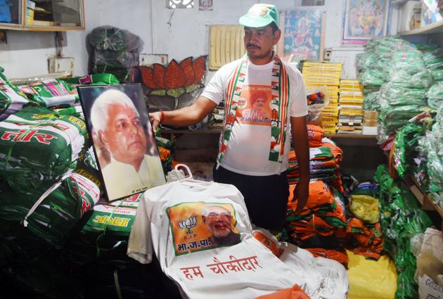 A seller is seen arranging election related material in his shop in Patna in this file photo. Mewa Lal Choudhary of the Janata Dal(United), Divya Prakash of the Rashtriya Janata Dal (RJD) and Mina Devi of the Lok Janshakti Party (LJP) are among those in the fray in Bihar’s Tarapur assembly constituency. (Parwaz Khan /HT Photo) A seller is seen arranging election related material in his shop in Patna in this file photo. Mewa Lal Choudhary of the Janata Dal(United), Divya Prakash of the Rashtriya Janata Dal (RJD) and Mina Devi of the Lok Janshakti Party (LJP) are among those in the fray in Bihar’s Tarapur assembly constituency. (Parwaz Khan /HT Photo)