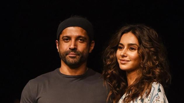 Indian Bollywood actors and singers Farhan Akhtar (L) and Shibani Dandekar (R) poses for photographs at the Lakmé Fashion Week. (AFP) Indian Bollywood actors and singers Farhan Akhtar (L) and Shibani Dandekar (R) poses for photographs at the Lakmé Fashion Week. (AFP)