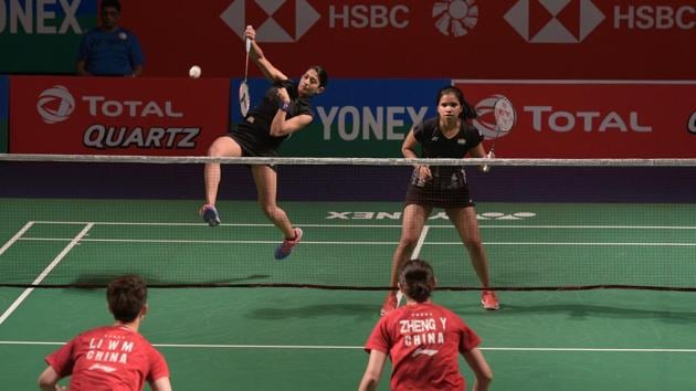 Ashwini Ponnappa and N. Sikki Reddy (R) of India in action against Zheng Yu and Li Wenmei of China during their women doubles during the Indian Open badminton tournament at KD Jadhav Indoor Hall in New Delhi. (Mohd Zakir / HT Photo) Ashwini Ponnappa and N. Sikki Reddy (R) of India in action against Zheng Yu and Li Wenmei of China during their women doubles during the Indian Open badminton tournament at KD Jadhav Indoor Hall in New Delhi. (Mohd Zakir / HT Photo)
