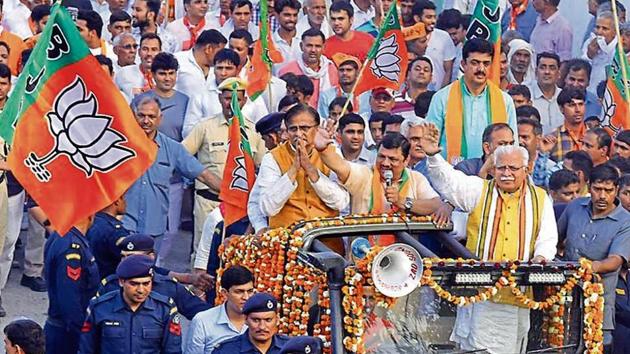 Haryana chief minister Manohar Lal Khattar during his roadshow in Bahadurgarh of Jhajjar district on Saturday Haryana chief minister Manohar Lal Khattar during his roadshow in Bahadurgarh of Jhajjar district on Saturday
