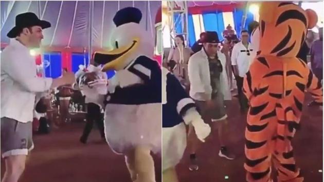 Salman Khan dancing with Donald Duck and Tigger.