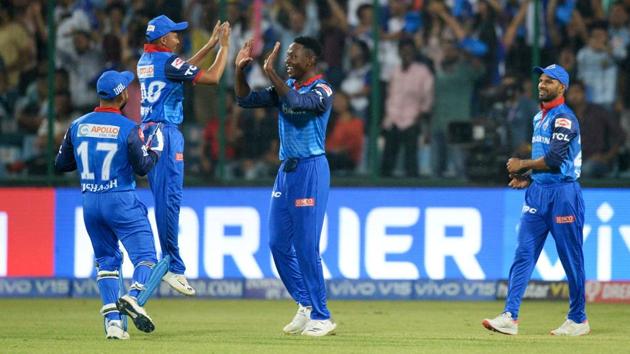 Delhi Capitals cricketer Kagiso Rabada (C) celebrates with teammates.(AFP)