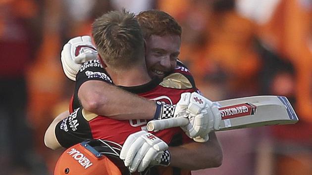 Sunrisers Hyderabad's David Warner hugs Jonny Bairstow on scoring hundred runs against Royal Challengers Bangalore.(AP)