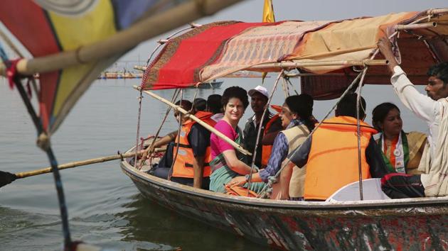 Congress party General Secretary and eastern Uttar Pradesh state in-charge Priyanka Gandhi Vadra, center, takes a boat ride to the Sangam, the confluence of sacred rivers the Yamuna, the Ganges and the mythical Saraswati, in Prayagraj, India, Monday, March 18, 2019. Gandhi kicked off her election campaign with a three day Ganges river ride to Varanasi. (AP Photo/Rajesh Kumar Singh) (AP) Congress party General Secretary and eastern Uttar Pradesh state in-charge Priyanka Gandhi Vadra, center, takes a boat ride to the Sangam, the confluence of sacred rivers the Yamuna, the Ganges and the mythical Saraswati, in Prayagraj, India, Monday, March 18, 2019. Gandhi kicked off her election campaign with a three day Ganges river ride to Varanasi. (AP Photo/Rajesh Kumar Singh) (AP)
