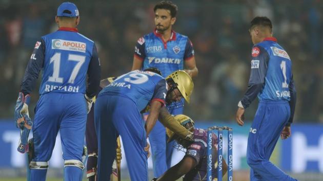 KKR batsman Andre Russell falls on the ground. (PTI) KKR batsman Andre Russell falls on the ground. (PTI)