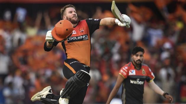 SRH batsman David Warner celebrates after reaching his century. (PTI)