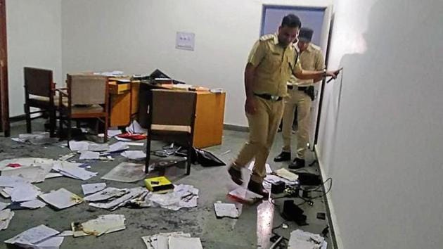 Cops examining the spot at the juvenile detention centre in Madhuban, Karnal, on Sunday, March 31, 2019.(HT Photo)