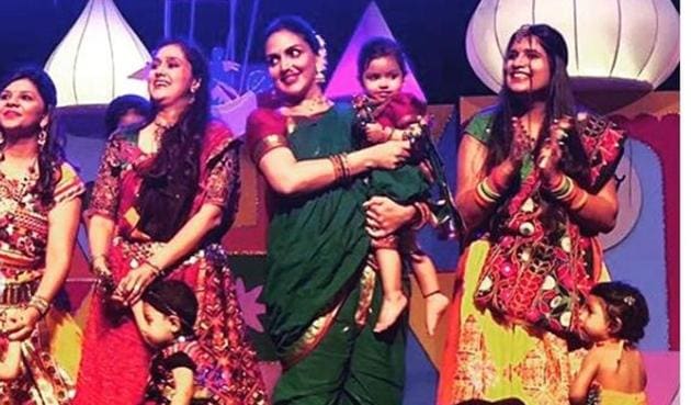 Esha Deol dancing with daughter Radhya on stage.