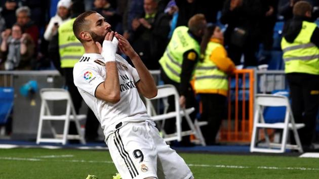 Real Madrid's Karim Benzema celebrates after scoring a goal.(Reuters)
