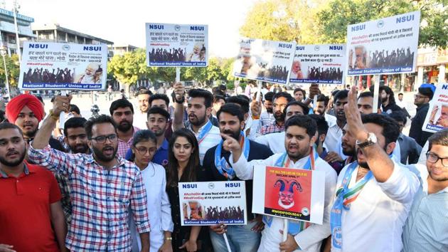 NSUI Members holding protest on April Fool day at plaza sector 17 Chandigarh on Monday(Karun Sharma/Hindustan Times)