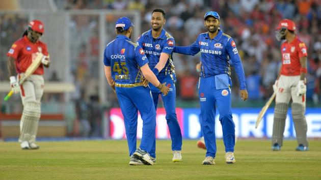 Mumbai Indians bowler Krunal Pandya (C) celebrates with his teammates.(AFP)