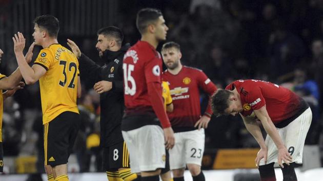 Manchester United's Scott McTominay, right, reacts at the end of the English Premier League soccer match between Wolverhampton Wanderers and Manchester United. (AP) Manchester United's Scott McTominay, right, reacts at the end of the English Premier League soccer match between Wolverhampton Wanderers and Manchester United. (AP)