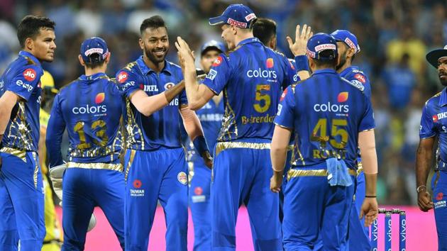 Mumbai Indians' bowler Hardik Pandya (C) celebrates with team mates after taking the wicket of Mahendra Singh Dhoni. (AFP)
