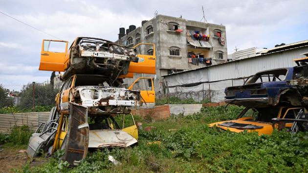 Car wrecks are seen at a garage. In vehicle scrapyards in the north, he saw stacks of discarded cars. With 53% of Gazans living in poverty, according to a United Nations report in December, valuable items such as cars are cannibalised for every accessory. (Dylan Martinez / REUTERS) Car wrecks are seen at a garage. In vehicle scrapyards in the north, he saw stacks of discarded cars. With 53% of Gazans living in poverty, according to a United Nations report in December, valuable items such as cars are cannibalised for every accessory. (Dylan Martinez / REUTERS)