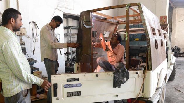 That is not stopping candidates from taking matters into their own hands and turning their cars into tanks as polling day draws near. “We want our customers and leaders to be safe,” said Narinder Singh, a mechanic at Sobti’s workshop in Punjab. (Narinder Nanu / AFP)