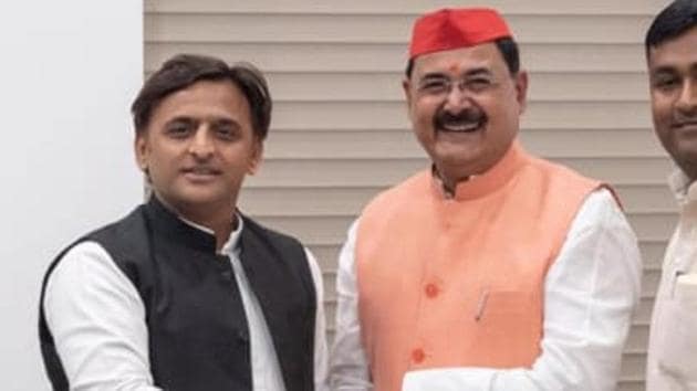 IP Singh with SP chief.(HT Photo) IP Singh with SP chief.(HT Photo)