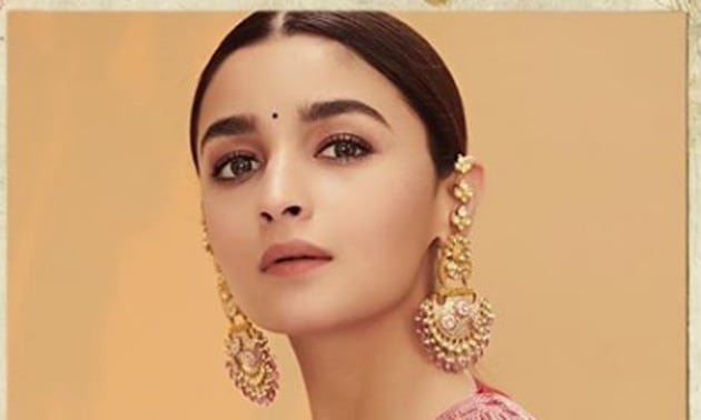 Alia Bhatt’s stunning red suit is the perfect post wedding outfit(Instagram)