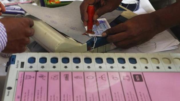 Mumbai, India - Oct. 8, 2014 : Election Commission staff seals the Electronic Voting Machines (EVMs) at 181 Mahim Assembly (Vidhan Sabha) Constituency election office in D'Silva School, Dadar, Mumbai, India on Wednesday, October 8, 2014, days ahead of the upcoming ASSEMBLY (VIDHAN SABHA) ELECTIONS on October 15, 2014. (Photo by Kalpak Pathak / Hindustan Times)(Hindustan Times)