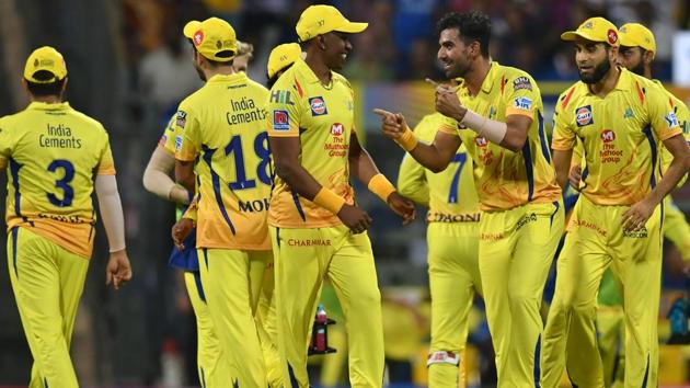 Chennai Super Kings bowler Deepak Chahar (3R) celebrates with teammates. (AFP)