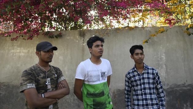 Residents of Deoli near South Delhi’s Ambedkar Nagar. The trend of changing names is not new. The Ambedkar Nagar area was earlier called Khanpur Harijan Basti. Some residents of Harijan Bastis go by their first names, owing to the stigma attached to being from a lower caste. Inhabitants of these localities in their late teens wish to attend regular colleges after graduating from their respective schools. (Burhaan Kinu / HT Photo)