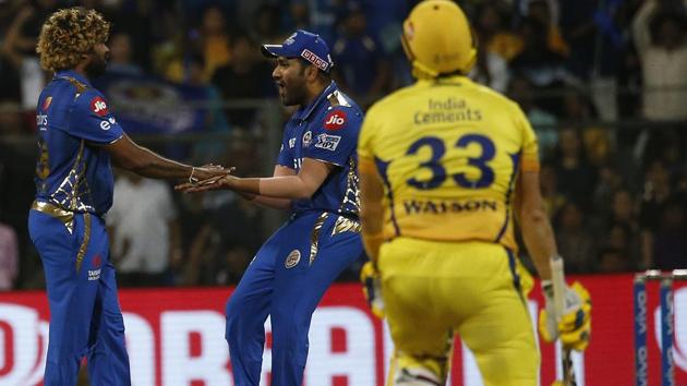 Mumbai Indians Lasith Malinga , left, celebrates with Rohit Sharma, center, the dismissal of Chennai Super Kings Shane Watson. (AP)