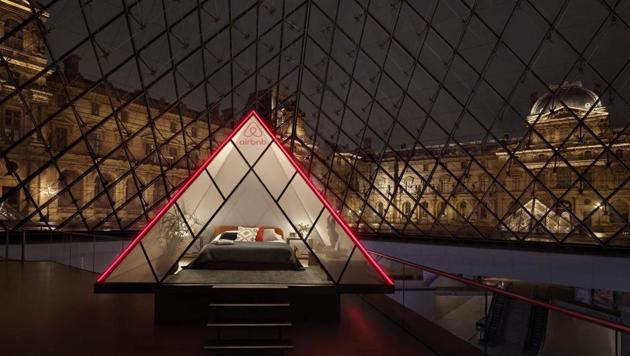 The Louvre’s iconic glass Pyramid will be specially designed to celebrate the building’s 30th anniversary.(Julian Abrams/Airbnb)