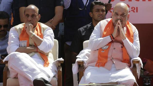 India's ruling Bharatiya Janata Party (BJP) president Amit Shah, right, and Home Minister Rajnath Singh(File) India's ruling Bharatiya Janata Party (BJP) president Amit Shah, right, and Home Minister Rajnath Singh(File)