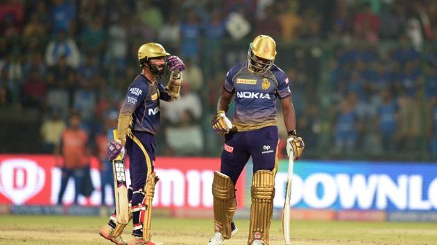 File image of Dinesh Karthik, Andre Russell(AFP)