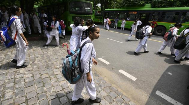 School children leave school after a two-month long summer vacation break, New Delhi, July 3, 2017(Arun Sharma/HT PHOTO)