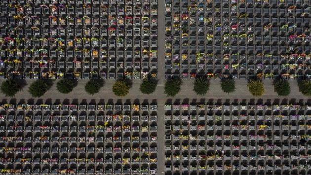 An aerial picture of graves ahead of the annual Qingming festival, or Tomb Sweeping Day, at a cemetery in Dagantangcun, 30 km east of Beijing, China. During Qingming, Chinese traditionally tend to the graves of their departed loved ones and often burn paper money, model houses, cars, mobile phones and other goods as offerings to honour them and keep them comfortable in the afterlife. (Fred Dufour / AFP) An aerial picture of graves ahead of the annual Qingming festival, or Tomb Sweeping Day, at a cemetery in Dagantangcun, 30 km east of Beijing, China. During Qingming, Chinese traditionally tend to the graves of their departed loved ones and often burn paper money, model houses, cars, mobile phones and other goods as offerings to honour them and keep them comfortable in the afterlife. (Fred Dufour / AFP)