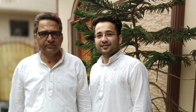 Junaid Ahmad of Uttar Pradesh secured the third rank in the Union Public Service Commission (UPSC) examination, results of which were declared on Friday. Junaid standing with his father in the picture.(HT photo) Junaid Ahmad of Uttar Pradesh secured the third rank in the Union Public Service Commission (UPSC) examination, results of which were declared on Friday. Junaid standing with his father in the picture.(HT photo)