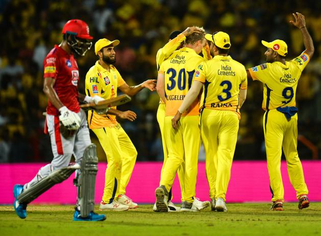 Chennai Super Kings cricketers celebrate a wicket of Kings XI Punjab K. L. Rahul during the 2019 Indian Premier League (IPL) Twenty20 cricket match between Chennai Super Kings and Kings XI Punjab at the M.A. Chidambaram Stadium in Chennai. (AFP) 