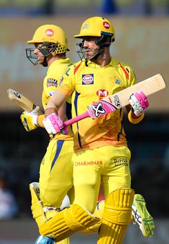 Chennai Super Kings cricketers Faf Du Plessis (L) and Shane Watson (R) run between the wickets during the 2019 Indian Premier League (IPL) match between Chennai Super Kings and Kings XI Punjab at the M.A. Chidambaram Stadium in Chennai. (AFP) 
