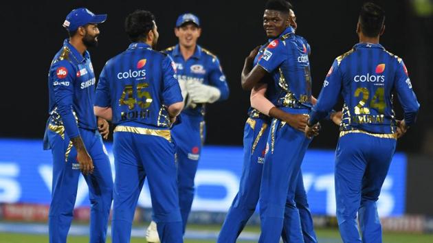 Alzarri Joseph celebrates a wicket with his teammates. (AFP)