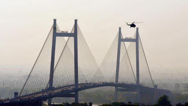 Prime Minister Narendra Modi arrives in a helicopter for an election rally, ahead of Lok Sabha polls, near Brigade Parade Ground, in Kolkata, West Bengal. (PTI) Prime Minister Narendra Modi arrives in a helicopter for an election rally, ahead of Lok Sabha polls, near Brigade Parade Ground, in Kolkata, West Bengal. (PTI)