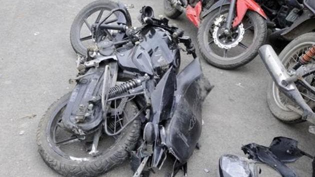 Two men on a two-wheeler were killed after colliding with a speeding container on early Friday morning at Mahalunge village.(PHOTO FOR REPRESENTATION PURPOSE ONLY) Two men on a two-wheeler were killed after colliding with a speeding container on early Friday morning at Mahalunge village.(PHOTO FOR REPRESENTATION PURPOSE ONLY)