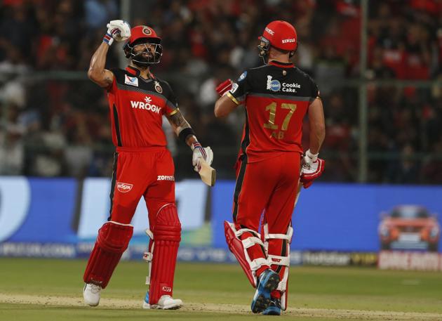 Virat Kohli and AB de Villiers powered RCB on with a 108-run partnership. (AP) Virat Kohli and AB de Villiers powered RCB on with a 108-run partnership. (AP)