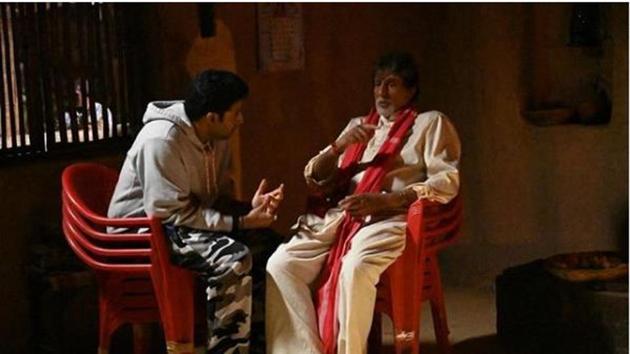 Abhishek visits dad Amitabh Bachchan on the sets of his upcoming film.